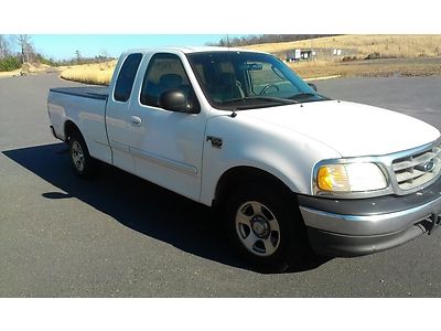 No reserve 2003 ford f150 xlt. great working condition