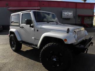 4x4 sahara wrangler*6 speed*xd rockstars*5.13 gears*35" nitto*we finance/trade