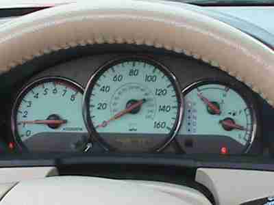 Convertible, leather seats, red exterior, tan interior, cd player, 6 cyl, image 7