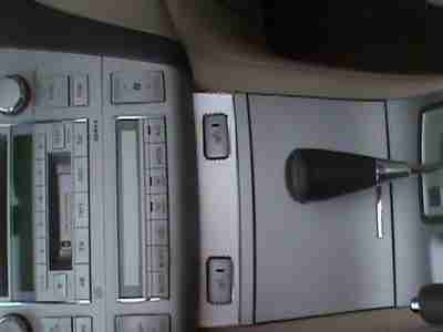Convertible, leather seats, red exterior, tan interior, cd player, 6 cyl, image 8