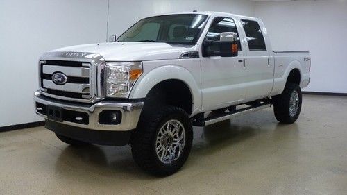 Lariat, fx4 off road, lifted, sync, leather, sprayed bed, chrome