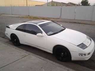 *white nissan *5 speed manual transmission *141k miles *runs good *17inch wheels