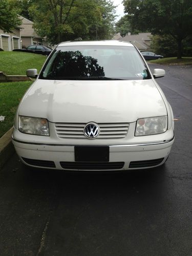 115,000 mi, white, ps, pb, sunroof, new tires,brakes, battery