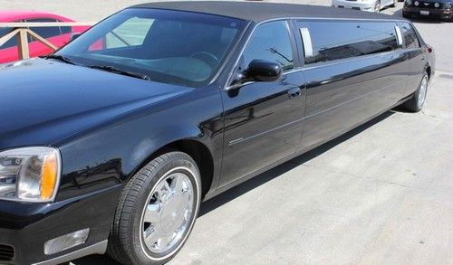 2004 cadillac dts stretch limousine. black, original owner, limo never rented