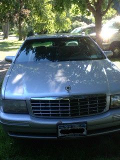 1999 cadillac deville, grey, auto, 4 door, low milage, excellent condition