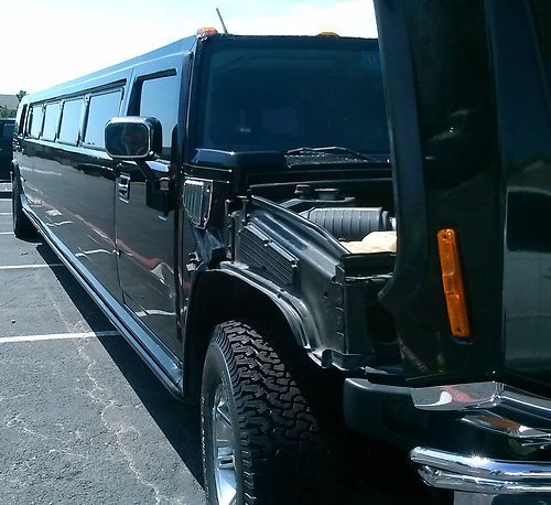 Black 2003 h2 hummer limousine