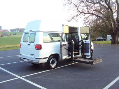 Dodge handicap ram 2500  raised roof power lift white low miles clean no reserve