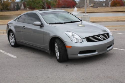 Silver coupe heated power leather seats sunroof sport alloy we finance