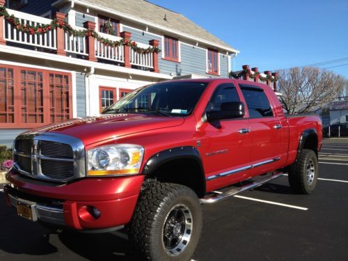 Mega cab slt laramie ( leather ) lifted! 5.9l diesel 4x4 low miles navigation