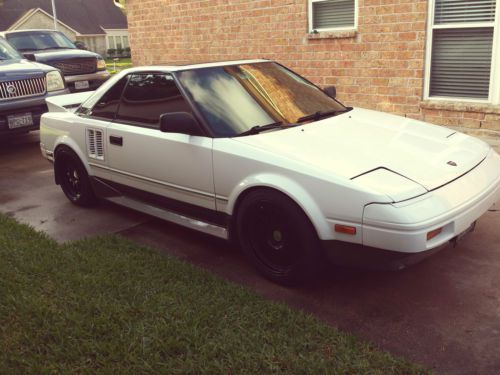 Rear mounted engine, ksport coilovers, jdm, rear wheel drive, mk1 mr2, two tone