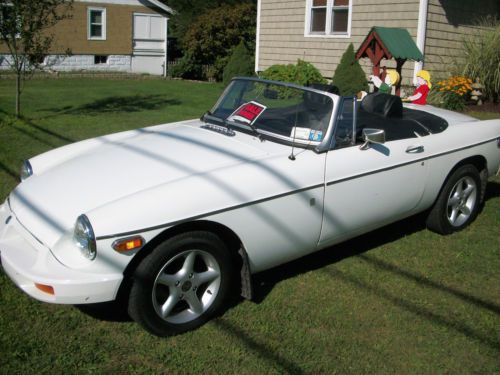 1976 white mgb with electric overdrive