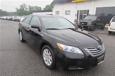 2009 toyota  camry hybrid only 9k miles best deal we finance