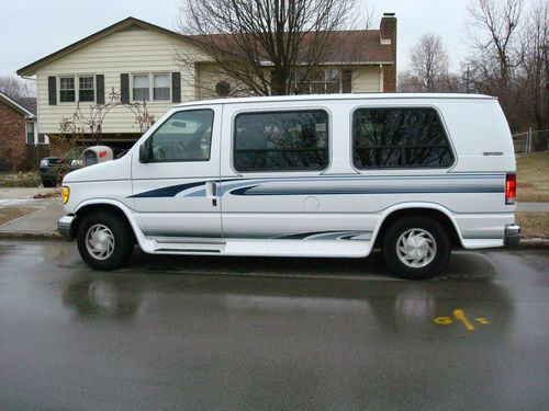 1995 ford e-150 centurion. white w/ blue ext. 140,000 miles, blue int.