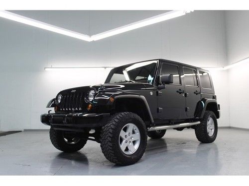 Unlimited x 3 inch lift 33" cooper tires black painted fenders hard top