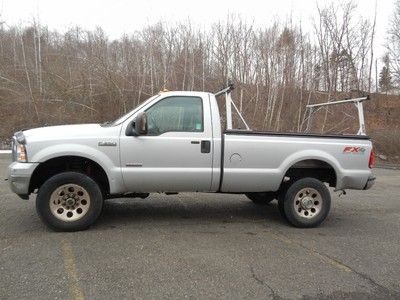 05 ford f350 xlt- sd powerstroke turbo diesel with tracrac ladderrack no reserve