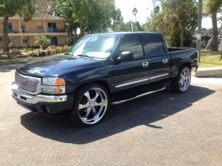 2006 gmc sierra 1500 sle crew cab pickup 26inch wheels , rebuilt title ,salvagen