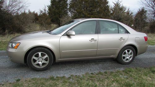 3.3 v6 gls sunroof automatic air cruise mach stereo well maintained