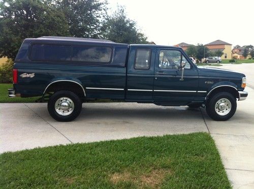 1997 ford f250 xlt v8 351 4x4 ext. cab very nice super low milage family owned