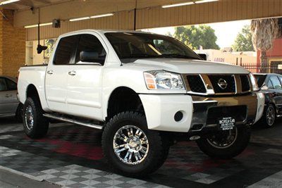 2007 nissan titan se quad cab pick up w/lift kit