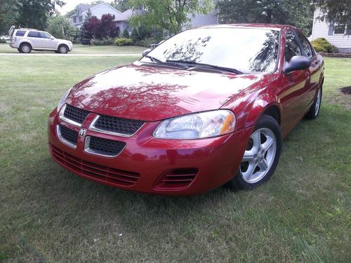 2004 dodge status  sxt cold a/c very clean sharp car!! 2.4l gas saver full power