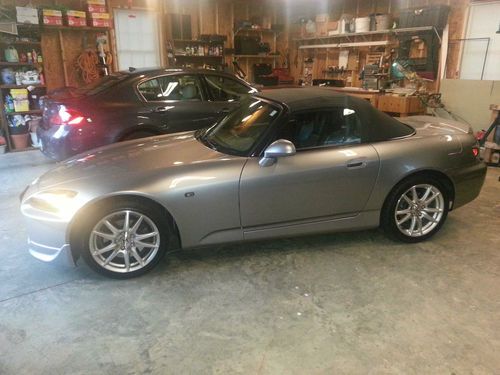 Here is the one you want! 2004 honda s2000 with only 10,800 miles!