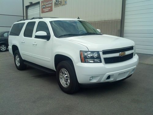 300 miles actual mileage! retired show vehicle 2012 suburban 3/4 ton clear title