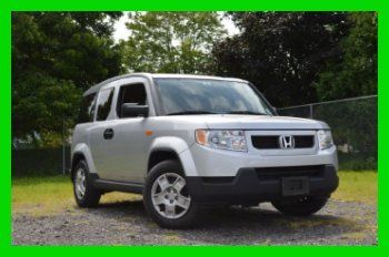 12,000 miles excellent automatic full power options  privacy glass and more save