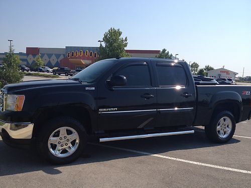 2012 sierra crew cab, rear sliding glass back window, tint, $2500 of accessories