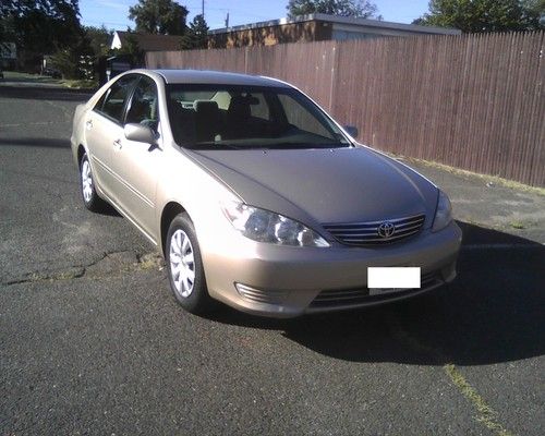 Beige , low miles, factory serviced, factory alarm, driven by grandma to market