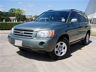 06 highlander suv,3rd row seats,cd/cassette,cold a/c,runs great!!