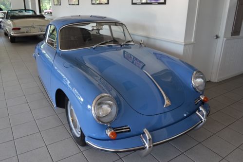 1965 porsche 356 sc coupe that has been fully restored.