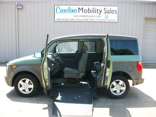 Wheel chair accessible vehicle with fold out ramp