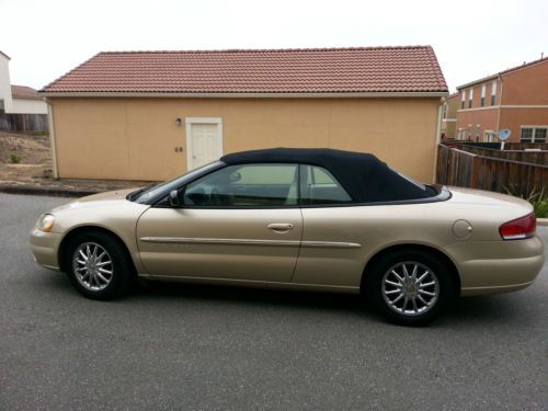 Gold, tan, convertible, used, nonsmoker, v-6, sedan, good condition, parts