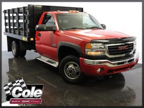 Red, stake truck, dump bed, power windows/locks, cruise, we finance!!