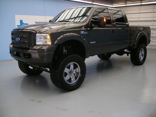 We finance!!!  2006 ford f-250 lariat 4x4 powerstroke diesel auto lift fox 20's!