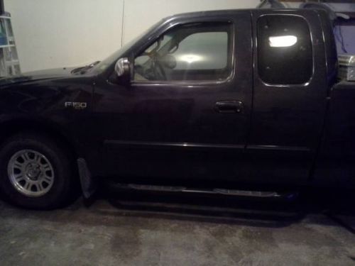 2000 black ford f-150 xlt exdt. cab