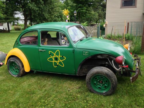 1970vw beetle. 4 speed manual stick green with yellow, extra front fenders