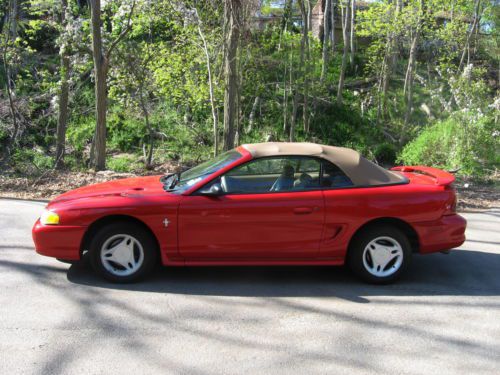 Red 1998 mustang convertable