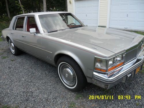 1979 cadillac seville - georgian silver w/red leather interior