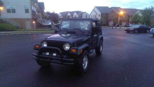 98 jeep wrangler tj sport 4x4 solid frame.  many new parts. clean carfax 1998