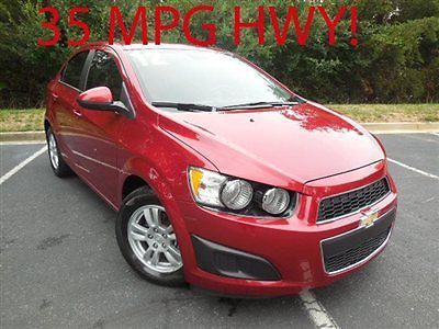 Chevrolet sonic 4dr sedan ls 2ls low miles automatic gasoline 1.8l 4 cyl crystal