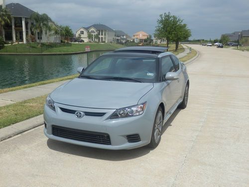 2012 scion tc. only 1k miles. 6-speed automatic. spoiler. sunroof. free shipping