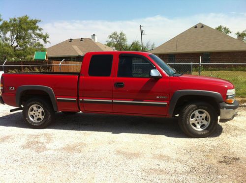 2002 chevy 1500 red ext cab 4wd