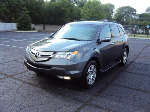 2007 acura mdx loaded , dvd , awd , very nice ,7 passengers,  look !!!!!!