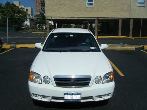 2004 KIA OPTIMA AND 2004 NISSAN QUEST SE, image 4