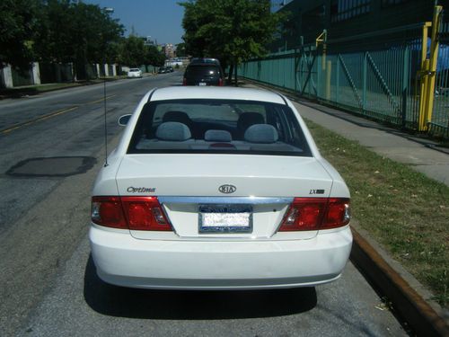 2004 KIA OPTIMA AND 2004 NISSAN QUEST SE, image 10