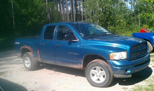 Blue quad cab 4x4 rusty 148000 miles