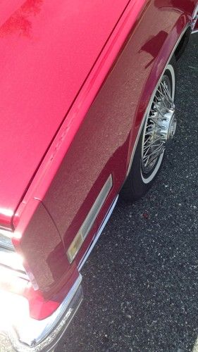 Beautiful red 1980 cadillac eldorado with white leather interior