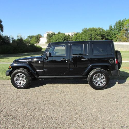 2013 wrangler unlimited rubicon 4x4 black/tan lthr nav 10k hardtop immaculate