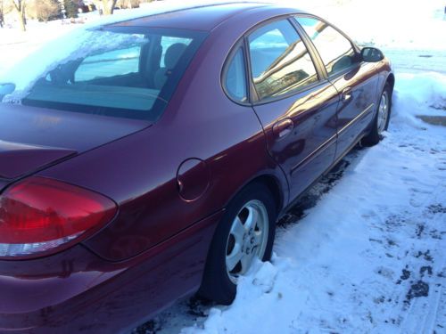 2007 red ford taurus
